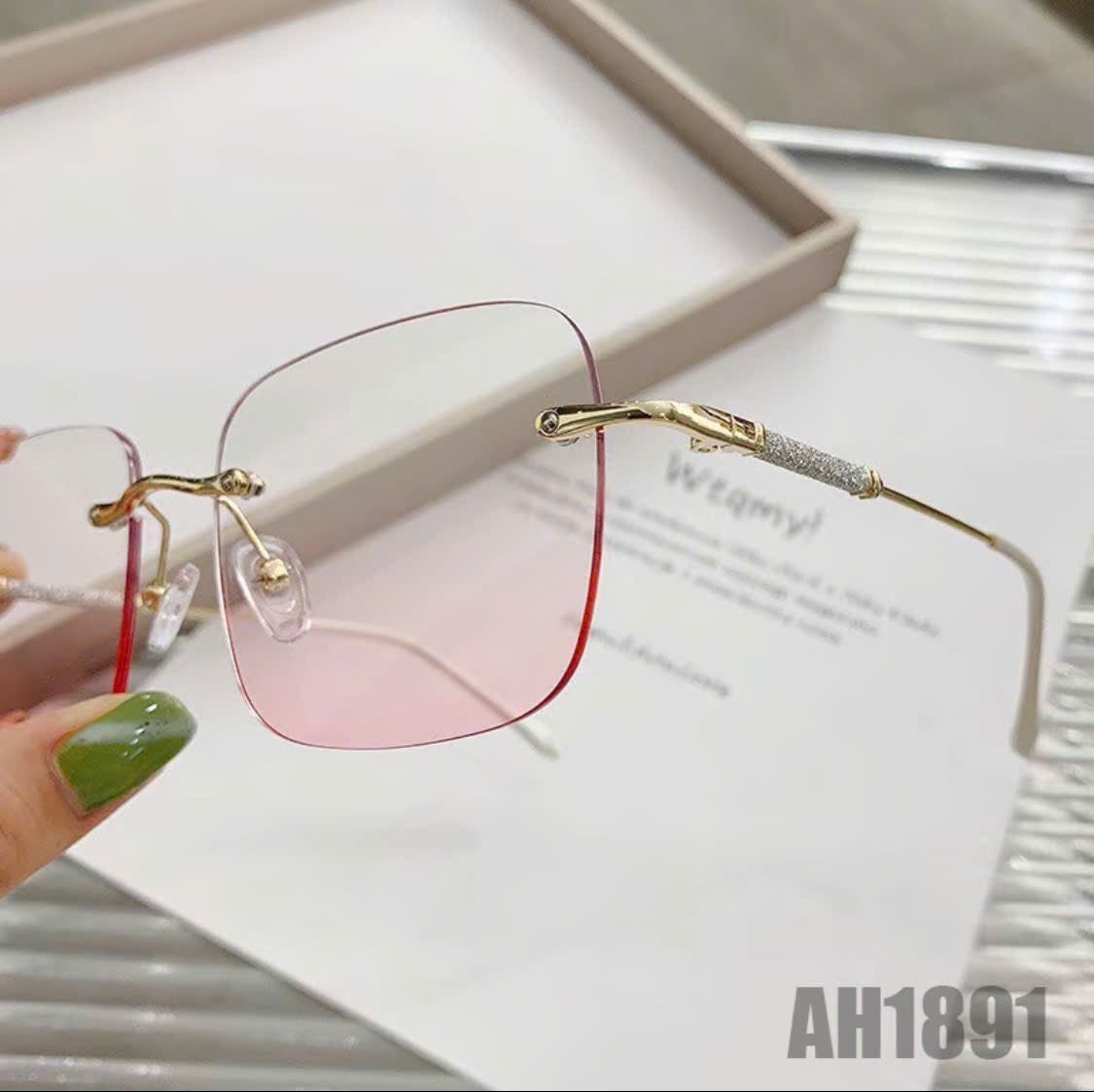Rimless blush-colored sunglasses, model THNT017